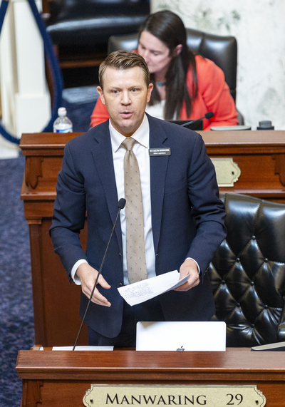 Rep. Dustin Manwaring, R-Pocatello, speaks from the House floor