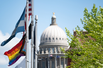 A Pride flag flies in front of Boise City Hall, just blocks from the Idaho Capitol