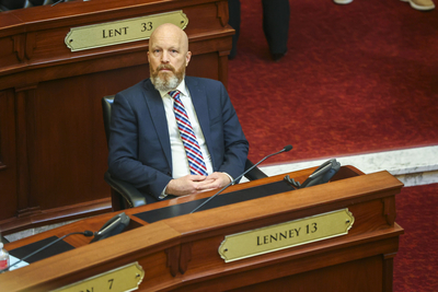 Sen. Brian Lenney, R-Nampa, listens to proceedings from the Senate floor