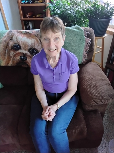 Cheryl Poxleitner, an Idaho nuclear downwinder who is helping others apply for radiation exposure compensation, poses for a photo in her home.