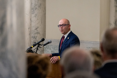 Idaho Secretary of State Phil McGrane leads a lying in state ceremony for former Idaho Gov. Dirk Kempthorne in the Idaho State Capitol.