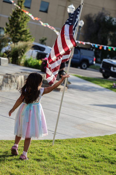 A young child celebrates World Refugee Day in Pocatello