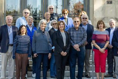 Democratic candidate for Idaho attorney general Lori Hickman stands in front of more than a dozen deputy attorneys general, and two former Republican AGs, who endorsed her in the 2026 election.