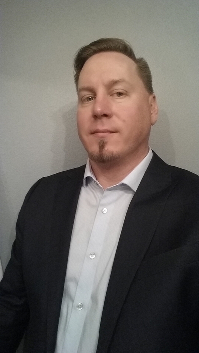 Idaho Democratic candidate for secretary of state, Shawn Keenan, poses for a professional photo.