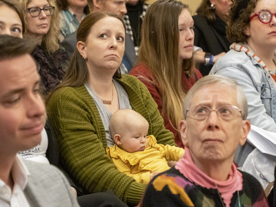 Crowd listens to testimony