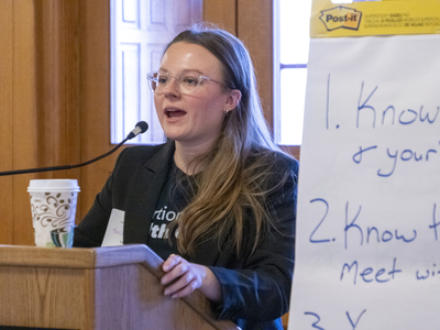 Lauren Klapper, with Planned Parenthood Great Plains Votes, provides instruction on how to engage lawmakers during a rally on bodily autonomy
