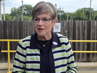 Gov. Laura Kelly speaks to reporters after voting in the Kansas primary election on July 28, 2026.