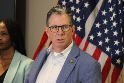 State Sen. Greg Miller speaking at press conference at Denka plant