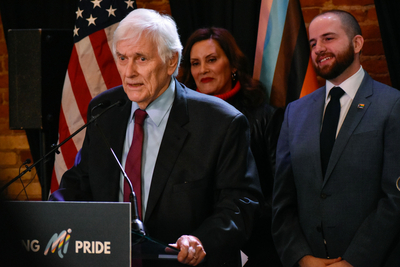Whitmer signs LGBTQ+ non-discrimination bill into law alongside civil rights pioneer Mel Larsen