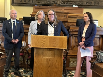 House Minority Leader Kim Abbott, D-Helena, addresses the 2023 legislative session on May 3, 2023, a day after lawmakers adjourned. Behind her are Senate Minority Leader Pat Flowers, Sen. Shannon O'Brien, and Rep. Alice Buckley.