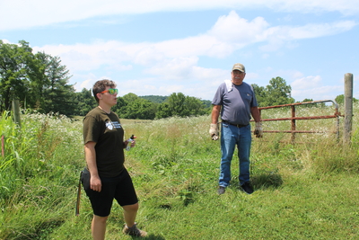 Buckeye Environmental Network organizer Bev Reed (left) and Bob Wilson, an oil producer in Washington County (right), in Marietta on July 7, 2026. (Photo by Megan Henry, Ohio Capital Journal).