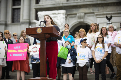 State Rep. Jessica Benham, D-Allegheny, speaks during a rally at the Pennsylvania state Capitol advocating for direct service providers to receive more money in the 2022-23 state budget. May 24, 2022. Harrisburg, Pa. (Photo by Amanda Berg, for the Capital-Star).