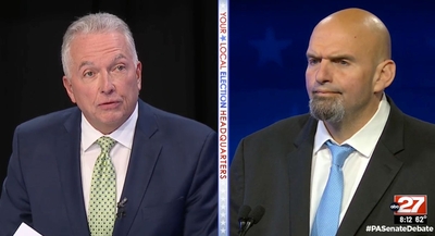 WHTM-TV anchor Dennis Owens (L) questions Democratic U.S. Senate candidate John Fetterman during a debate aired statewide on Tuesday, 10/25/22 (Screen Capture).