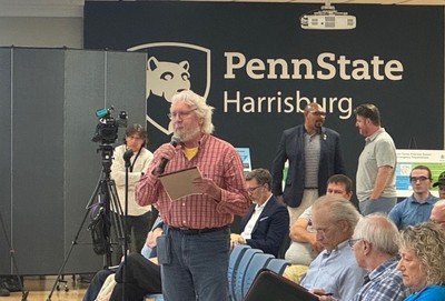 Larry Arnold speaks at a public meeting on restarting the Three Mile Island nuclear power plant on July 31 in Middletown, Dauphin County. (Photo by Ian Karbal)