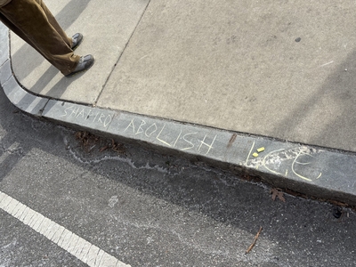 A message to Gov. Josh Shapiro scrawled on a Philadelphia street corner. Protesters braved freezing temperatures on January 24, 2026, to voice their anger over immigration enforcement tactics by the Trump administration. They also called on Shapiro to stand up to to federal efforts in other states. (Photo by John Cole for the Pennsylvania Capital-Star)