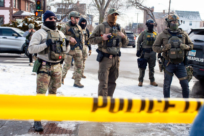 Federal agents on patrol in Minneapolis in January. A coalition of 22 states says the Trump administration appears to have violated a court order limiting the types of health data that can be shared with U.S. Immigration and Customs Enforcement for deportation proceedings. (Photo by Nicole Neri/Minnesota Reformer)