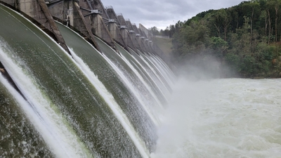 The Tennessee Valley Authority is releasing water from tributary dams like Douglas Dam, shown here, in Sevier County. The controlled release is intended to minimize additional flooding. (Photo: Tennessee Valley Authority)