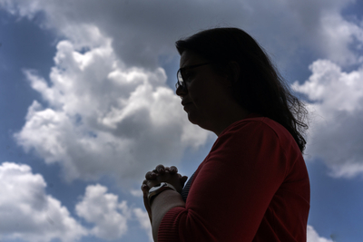 Alisa, outside her home, and her husband face being charged with child abandonment by the State of Tennessee even as they seek help for their foster child from state agencies. (Photo: John Partipilo/Tennessee Lookout)