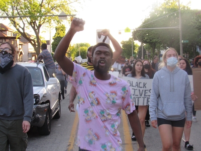 Protesters marching and gathering in Milwaukee during the first day of demonstrations. (Photo by Isiah Holmes)