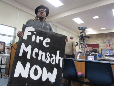 Protesters gather in Wauwatosa's city hall to call for Officer Joseph Mensah to be fired and arrested in 2020. (Photo by Isiah Holmes/ Wisconsin Examiner)