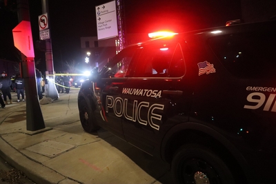 A Wauwatosa police squad on the scene of a non-fatal officer-involved shooting. (Photo by Isiah Holmes/Wisconsin Examiner)