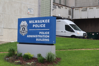 The Milwaukee Police Administration Building downtown. A surveillance van, or "critical response vehicle" is in the background. (Photo | Isiah Holmes)