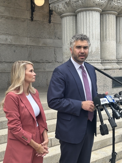 Attorneys representing former Milwaukee County Judge Hannah Dugan talk to media briefly after her sentencing. (Photo by Isiah Holmes/Wisconsin Examiner)