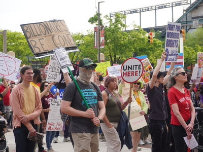 May Day rally expands to broad anti-Trump protest in Baltimore, across the nation