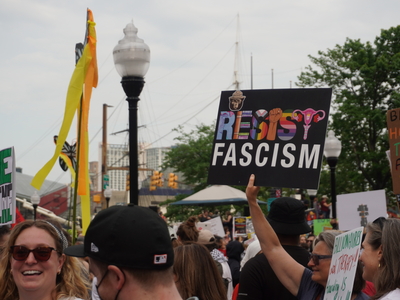 May Day rally expands to broad anti-Trump protest in Baltimore, across the nation