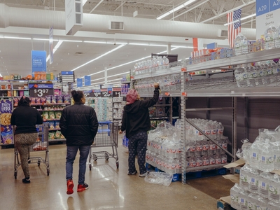 Austinites gathered supplies for the winter freeze at Walmart on Friday.