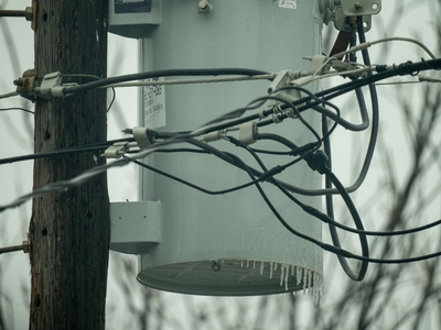 Icicles on a powerline distribution transformer in Dallas on Saturday.