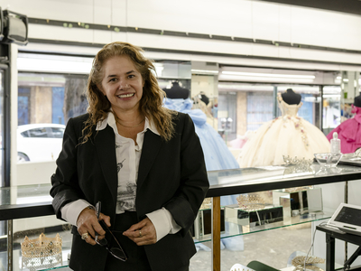 Gabriela, owner of La Novia dress boutique, poses for a portrait in Laredo on April 9, 2026. She has operated her store in downtown for about nine years.