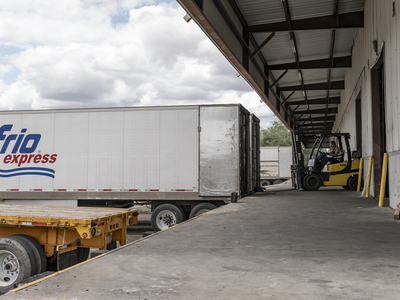 An employee at Midland International Logistics loads freight onto a trailer for export to Mexico in Laredo on April 10.