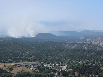 Smoke from the First Thunder Fire is visible looking west from Rapid City on Sept. 3, 2024. (Seth Tupper/South Dakota Searchlight)