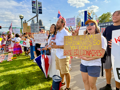Protesters use CWS as backdrop to decry Trump immigration policies, raids