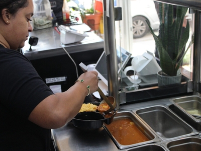 Hilltop heroes serve the neighborhood at Dominican Cafe