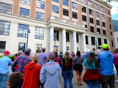 A crowd in front of the Alaska State Capitol for the 'Rage Against the Regime' rally and for public education on Aug. 2, 2025 (Photo by Corinne Smith/Alaska Beacon)