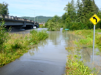 The Mendenhall River at flood levels seen after the glacial outburst flooding event on Aug 13, 2025 (Photo by Corinne Smith/Alaska Beacon)