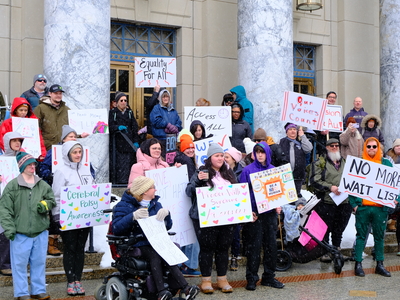 Demonstrators with the Key Coalition rally at the Alaska State Capitol for disability rights and increased services on Mar. 18, 2026. (Photo by Corinne Smith/Alaska Beacon)