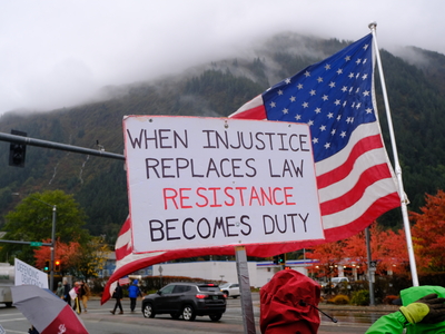 Demonstrators rally at a No Kings protest in Juneau on Oct. 17, 2026. (Photo by Corinne Smith/Alaska Beacon)