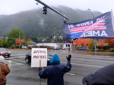 Demonstrators rally and urge early voting at a No Kings protest in Juneau on Oct. 17, 2026. (Photo by Corinne Smith/Alaska Beacon)