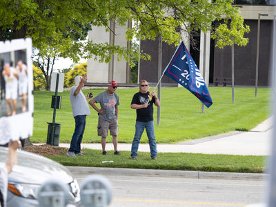 Pro-Trump counter-protestors appear at the June 14, 2025, "No Kings" rally at the Statehouse in Topeka
