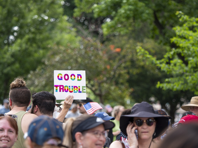 Kansans protest President Donald Trump at the June 14, 2025, "No Kings" rally at the Statehouse in Topeka.