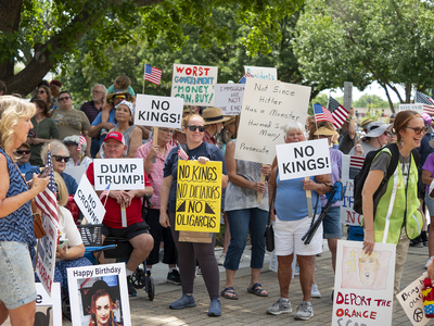 Kansans protest President Donald Trump at the June 14, 2025, "No Kings" rally at the Statehouse in Topeka.