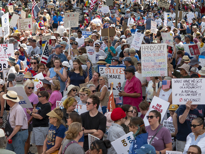 Kansans protest President Donald Trump at the June 14, 2025, "No Kings" rally at the Statehouse in Topeka.