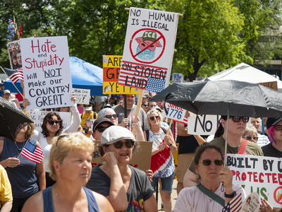 Kansans protest President Donald Trump at the June 14, 2025, "No Kings" rally at the Statehouse in Topeka.