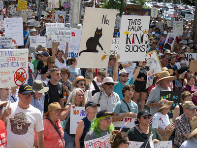 Kansans protest President Donald Trump at the June 14, 2025, "No Kings" rally at the Statehouse in Topeka.