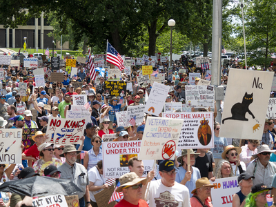 Kansans protest President Donald Trump at the June 14, 2025, "No Kings" rally at the Statehouse in Topeka.