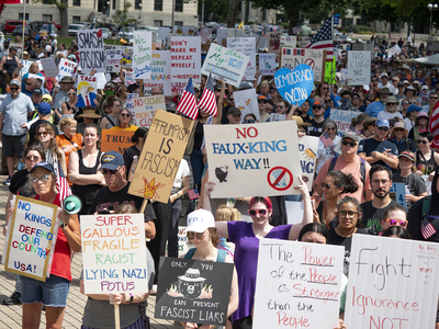 Kansans protest President Donald Trump at the June 14, 2025, "No Kings" rally at the Statehouse in Topeka.
