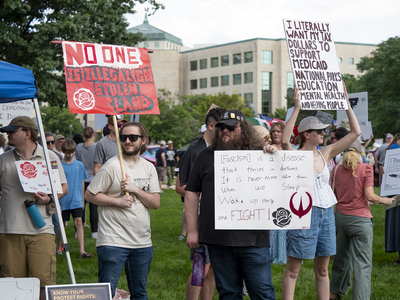 Kansans protest President Donald Trump at the June 14, 2025, "No Kings" rally at the Statehouse in Topeka.